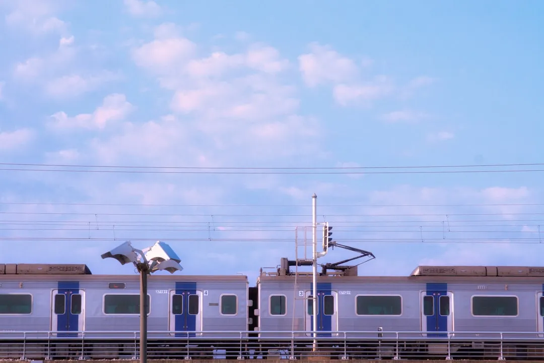 Train passing on elevated tracks for AREX airport train travel