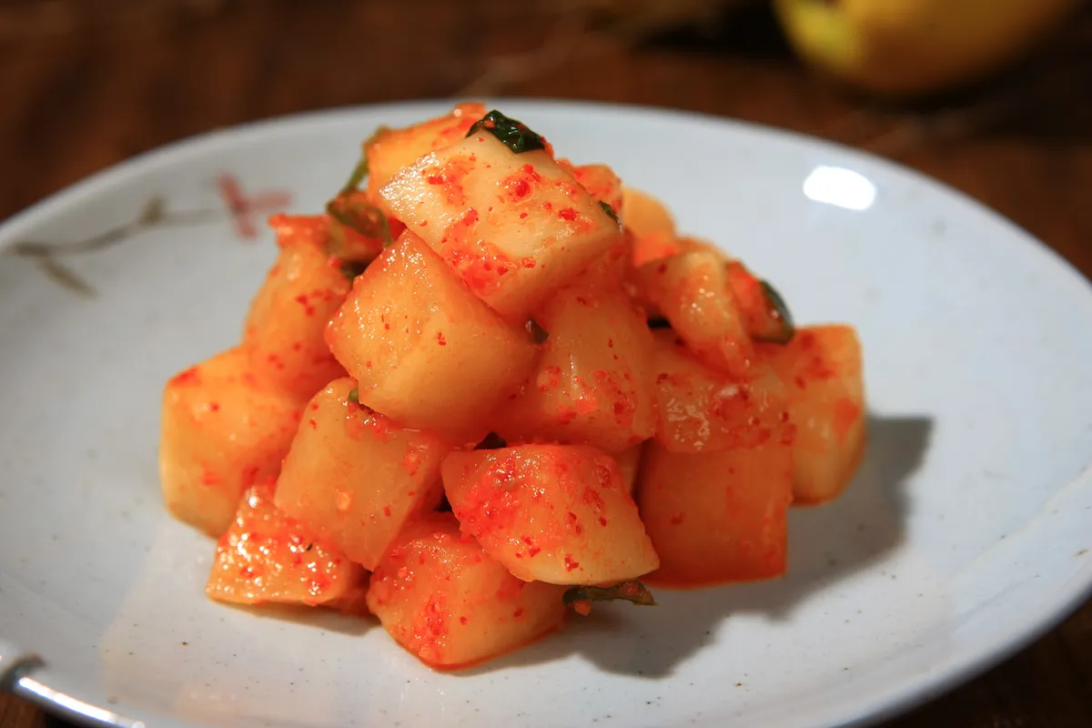 Kkakdugi diced radish kimchi served as Korean banchan