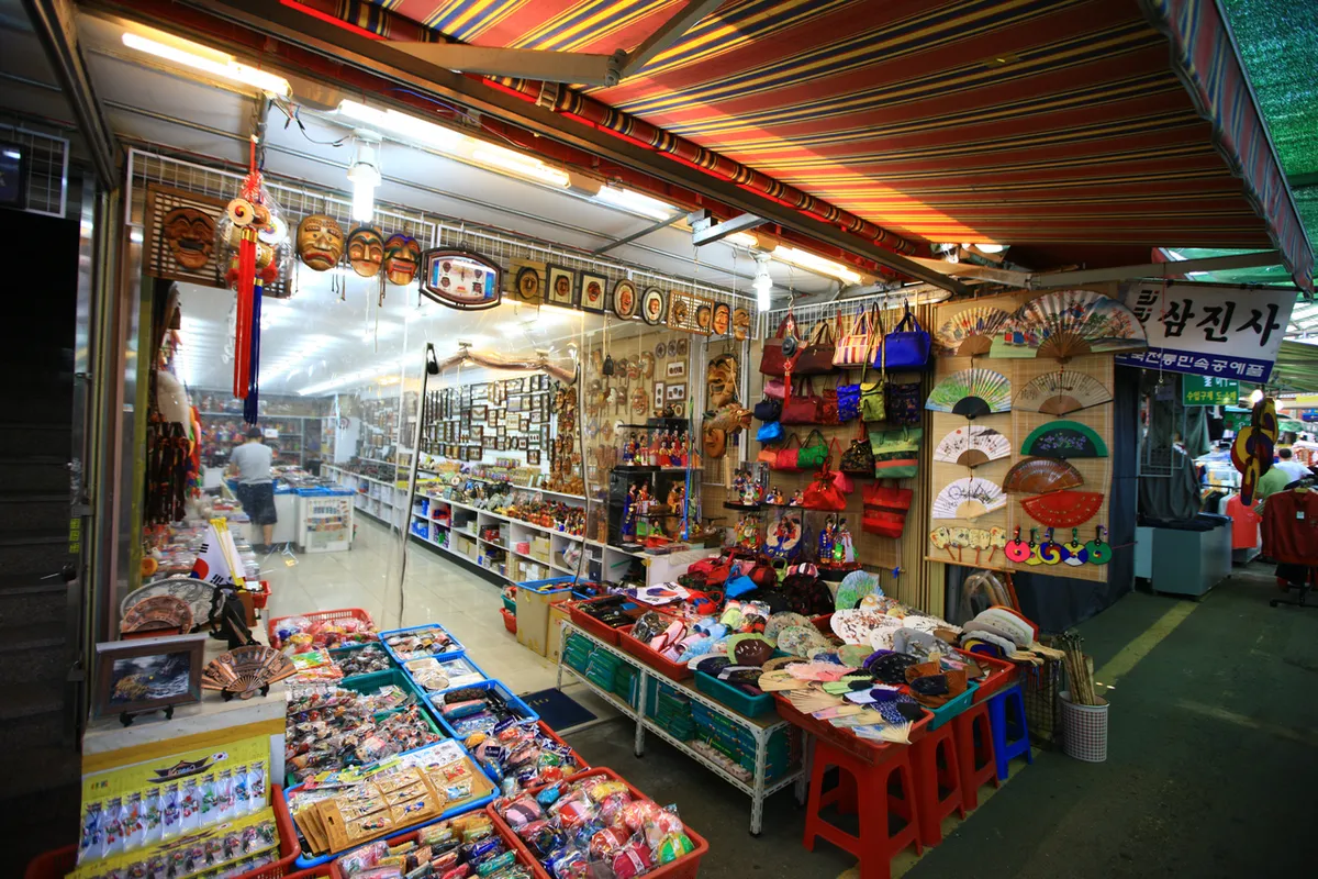 Packaged goods and souvenir displays at Busan International Market for Best Things to Buy in Korea