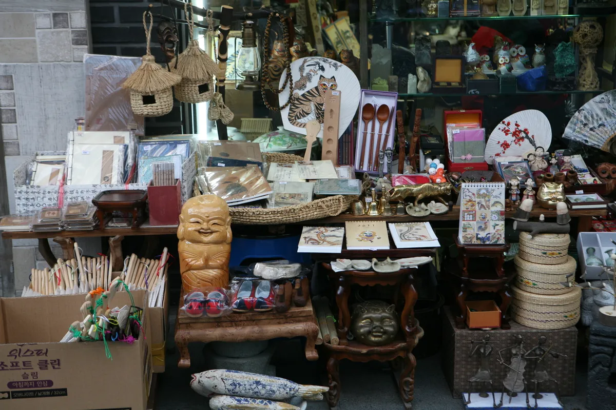 Traditional craft souvenirs displayed at an Insadong shop for Korea souvenir shopping