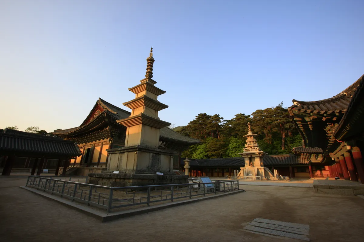 Two stone pagodas and temple halls in the Bulguksa Temple courtyard