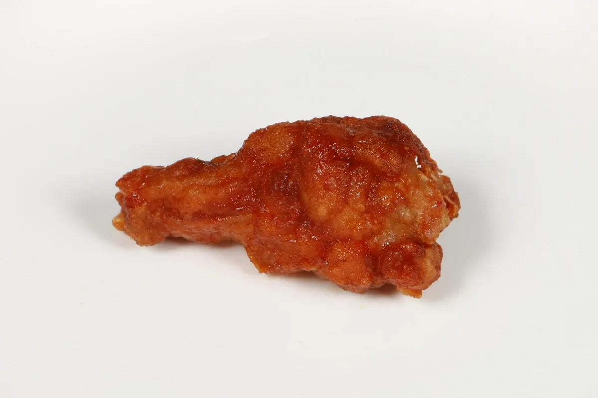 Yangnyeom chicken drumstick with red sauce for a chimaek guide