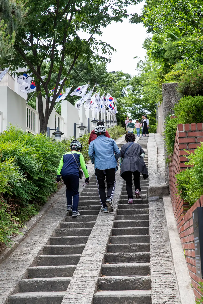 Cheongna Hill stairway and flags on the Daegu Modern Culture Alley route