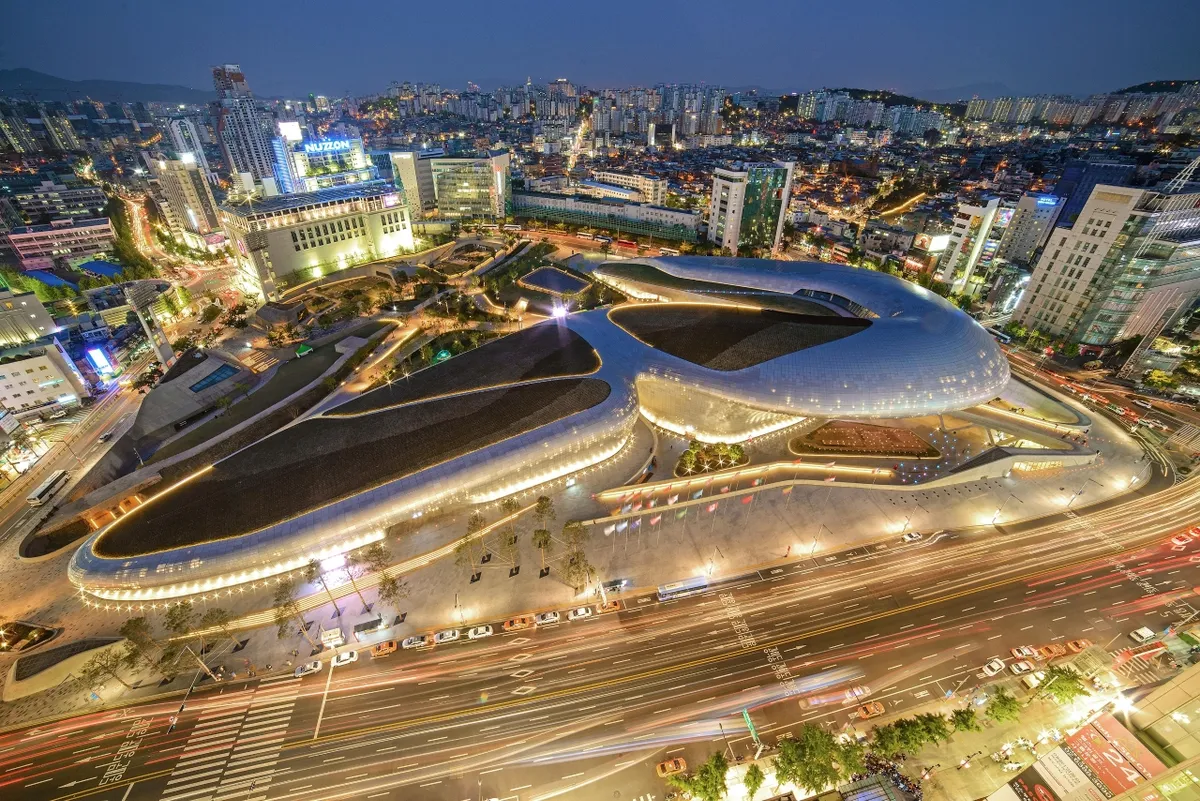 Illuminated Dongdaemun Design Plaza and surrounding roads for Dongdaemun night shopping