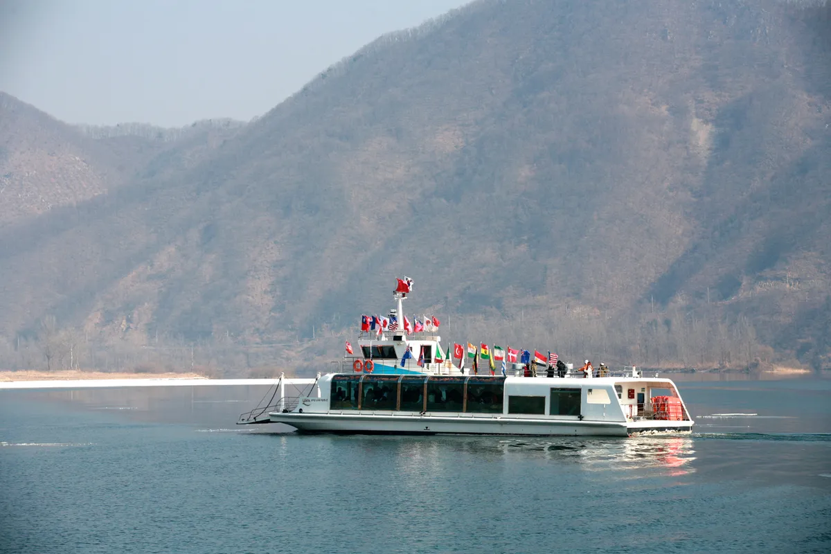 Ferry on the river near Nami Island for an autumn day trip from Seoul