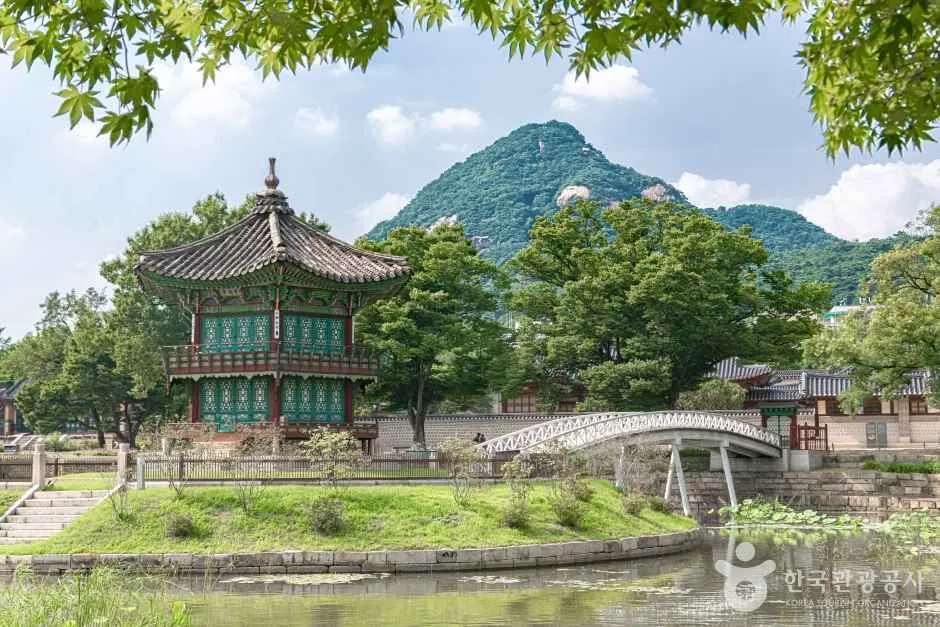 Hyangwonjeong Pavilion and white bridge by a pond at Gyeongbokgung Palace