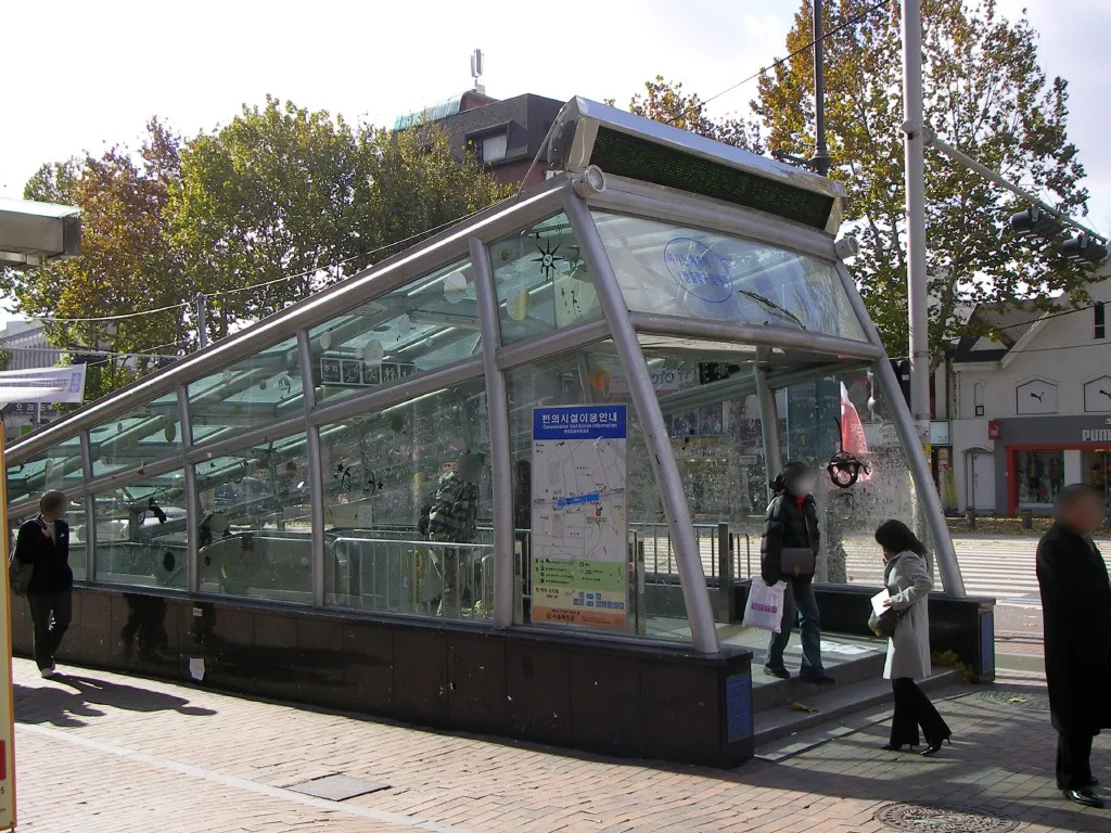 Glass-covered stair entrance at Hyehwa subway station in Seoul.