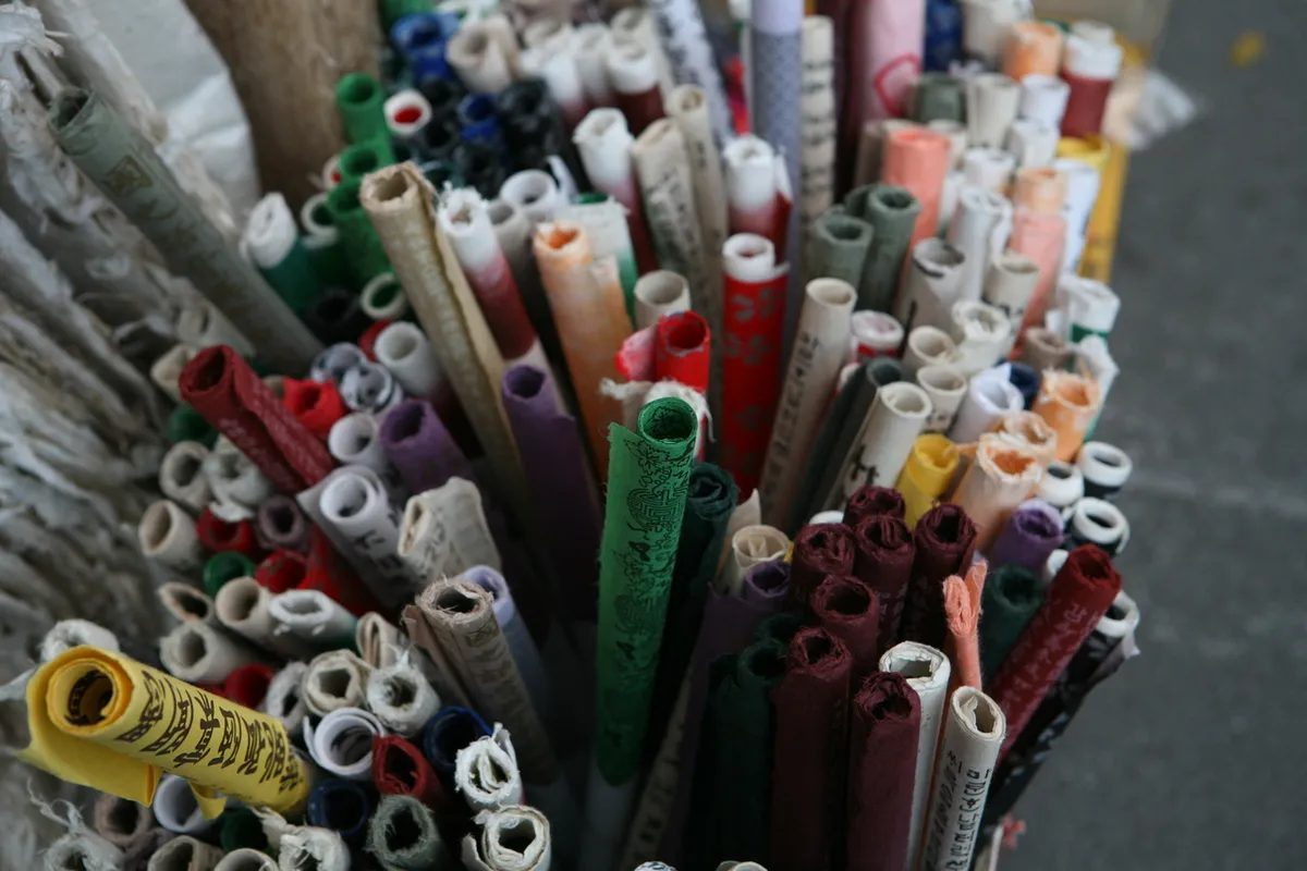 Rolls of colored craft paper and fabric materials for Insadong traditional souvenirs