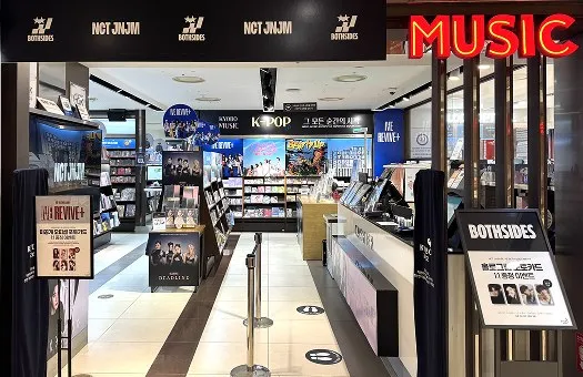Music department entrance with album displays and a K-POP sign at Kyobo Gwanghwamun