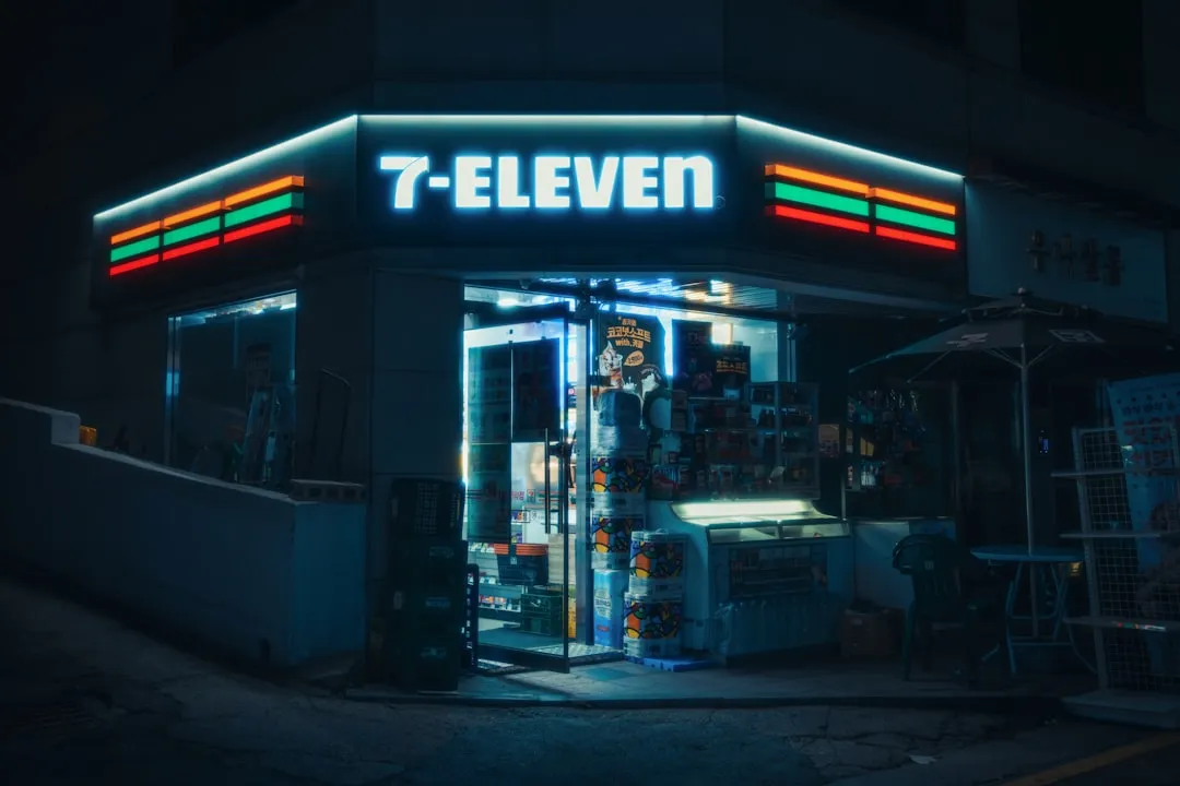 7-Eleven counter and storefront at night for Korea convenience store guide