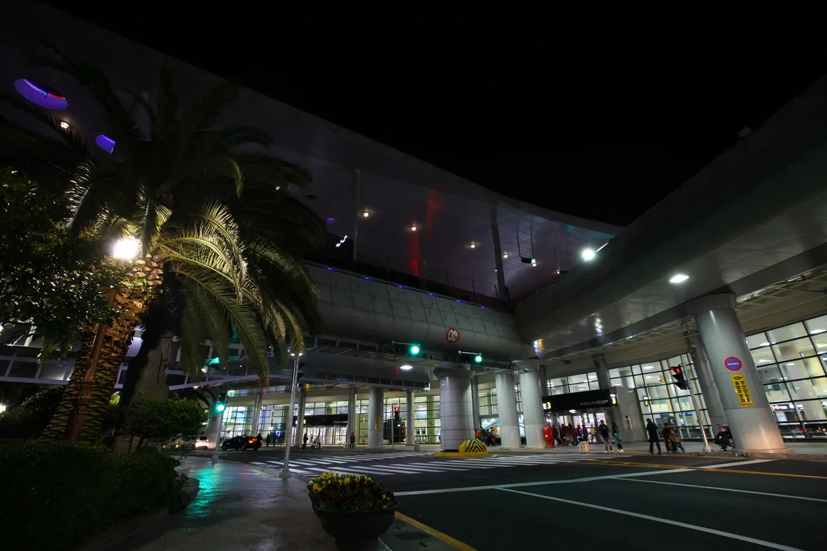 Jeju International Airport building at night for domestic flight passengers