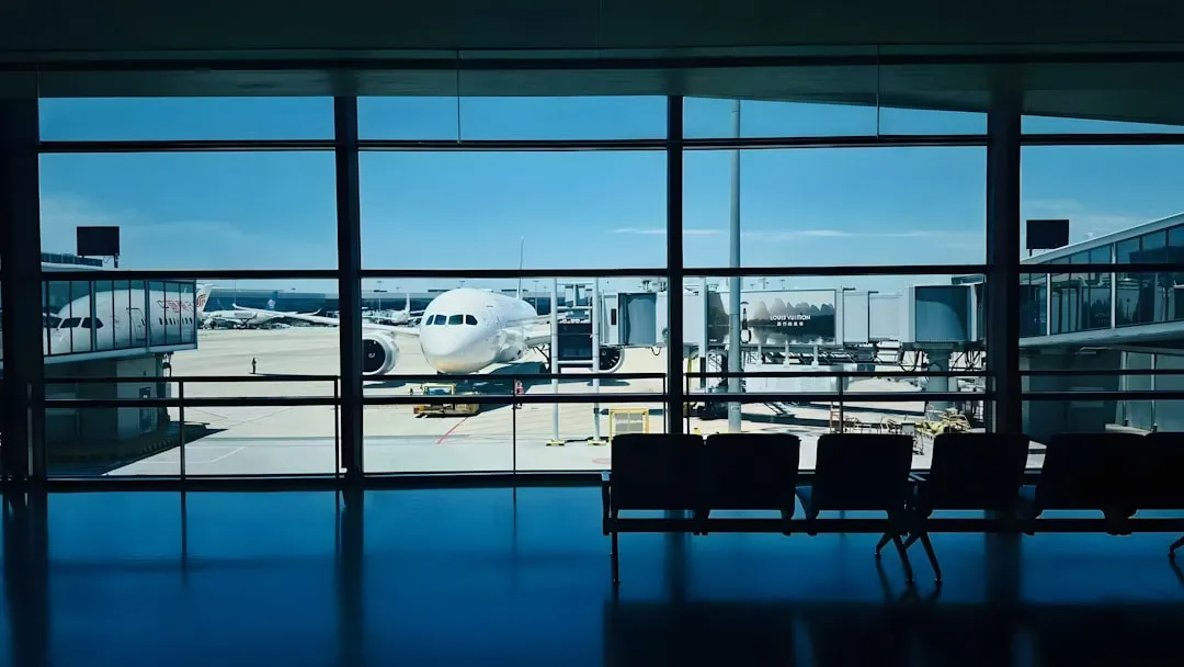 Airplane at airport gate for domestic flight boarding process