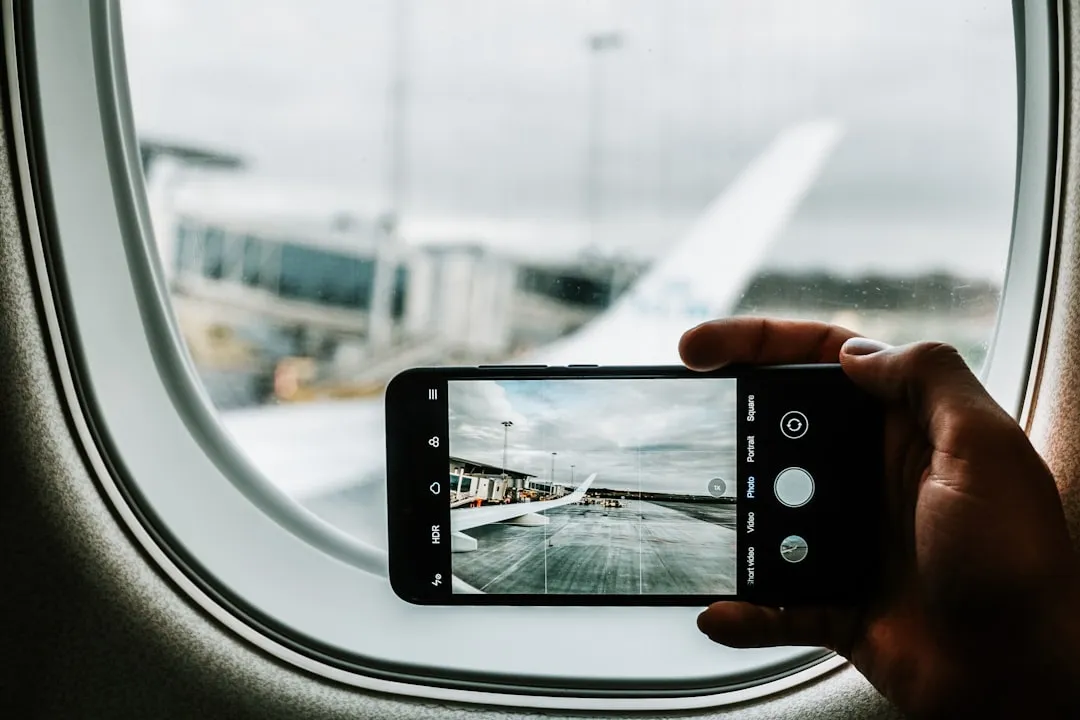 Traveler using a smartphone before completing a Korea arrival declaration