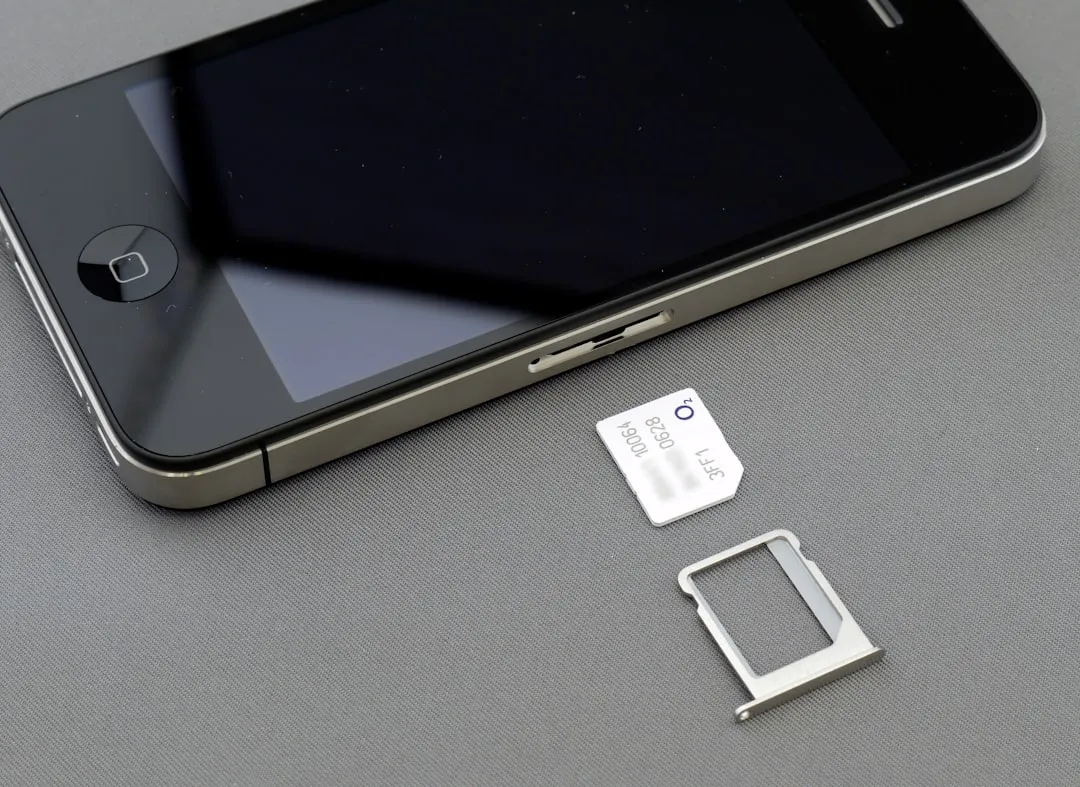 Smartphone beside travel documents for Korea eSIM setup before arrival