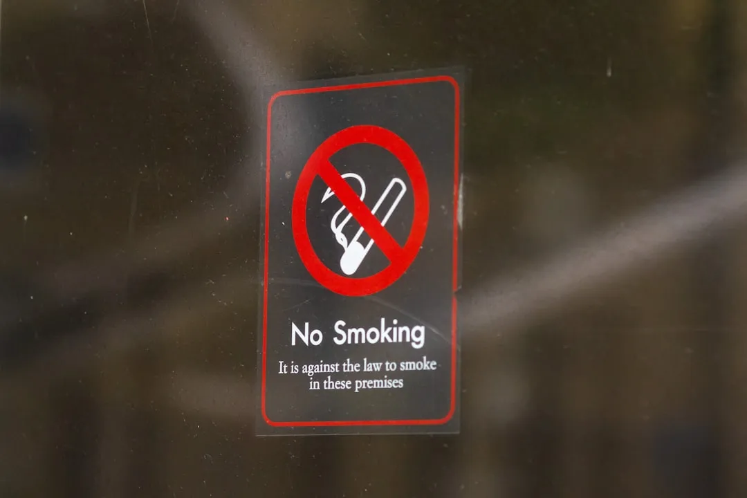 No smoking symbol on glass door for Korea smoking areas guide