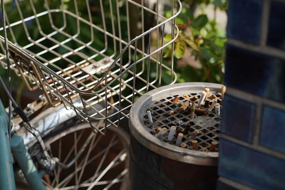 Ashtray with cigarette ends for Korea smoking areas guide