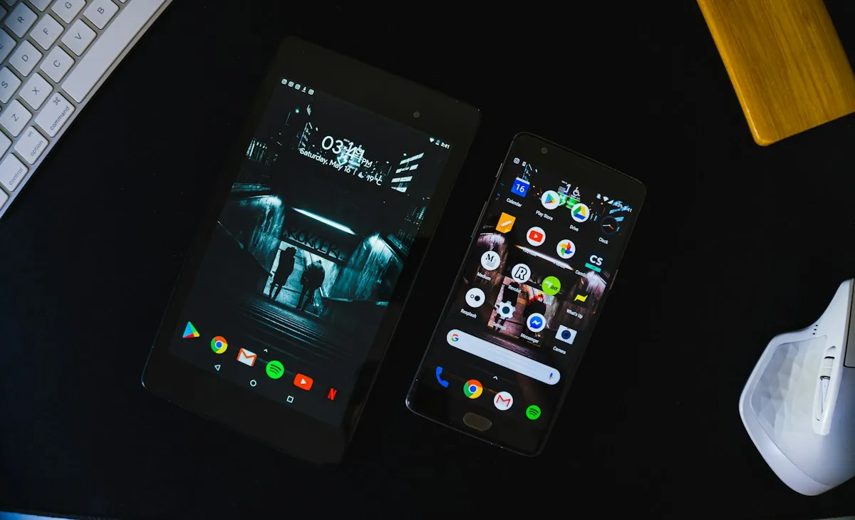 Android tablet and smartphone with English home-screen app icons for Korea travel apps preparation