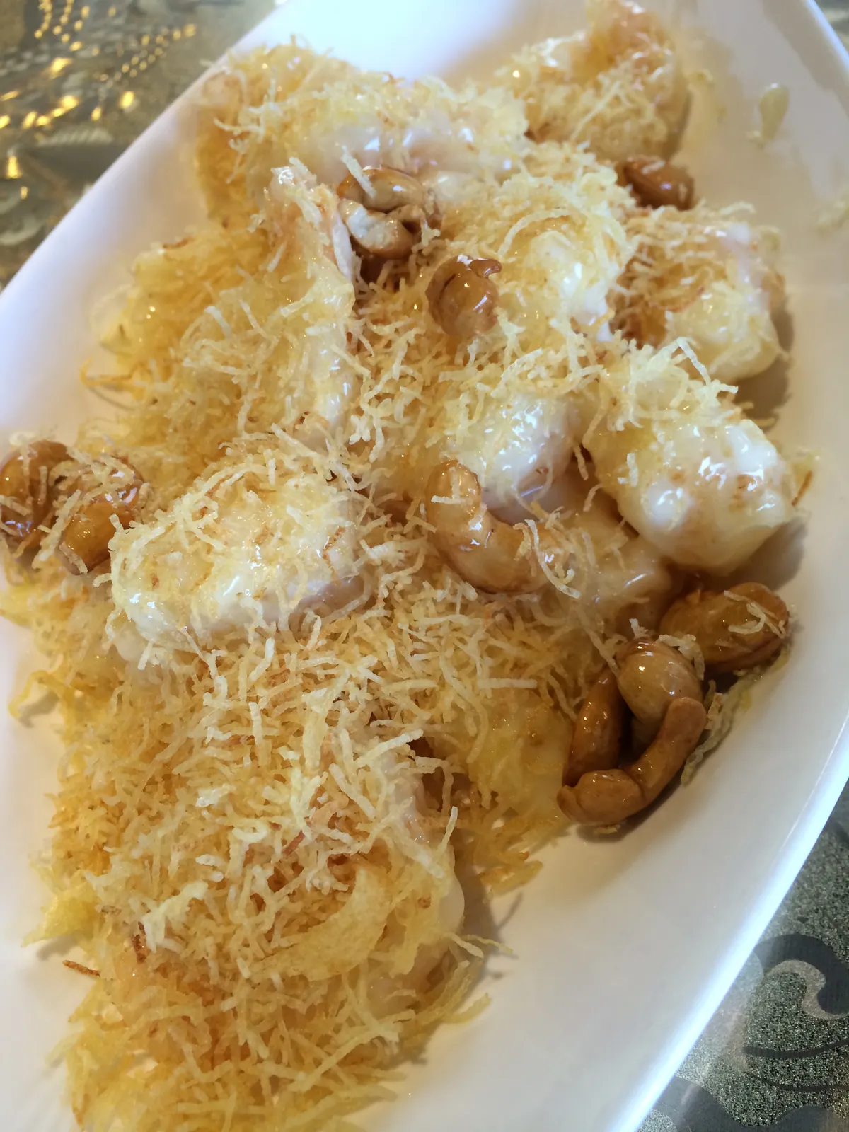 Golden fried shrimp with pale cream sauce, illustrating Korean baseball food cream shrimp