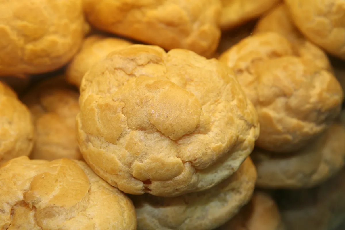 Cream buns arranged in a Korean bakery display for a Korean cafe bakery guide