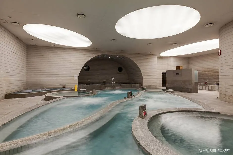 Indoor public bath pools at Spaland Centum City Korean sauna