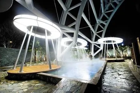Outdoor foot bath area at Spaland Centum City jjimjilbang in Busan