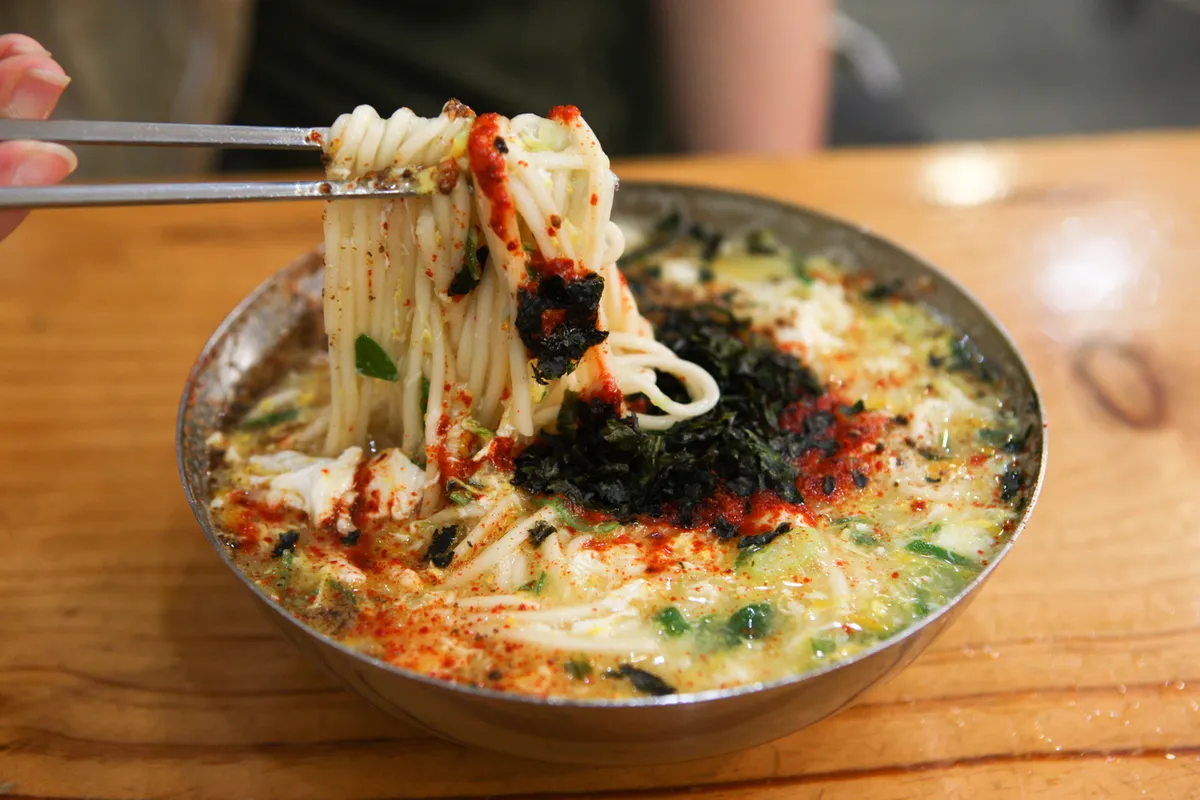 Kalguksu noodle soup with hand-cut wheat noodles for a Korean noodles guide