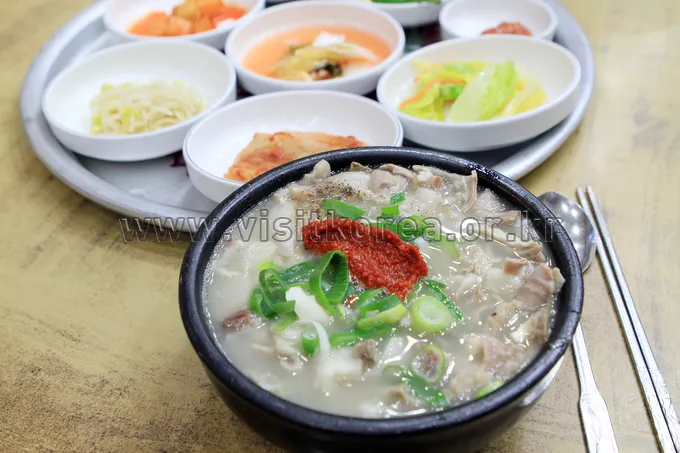 Bowl of pork gukbap soup with rice among Korean rice dishes