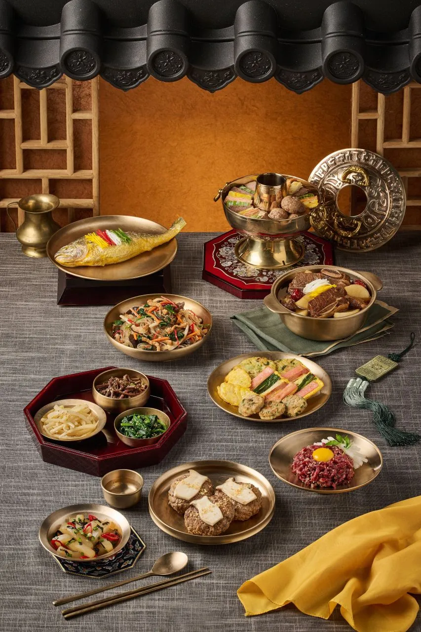 Hanjeongsik table arranged with rice soup meat vegetables and assorted Korean dishes