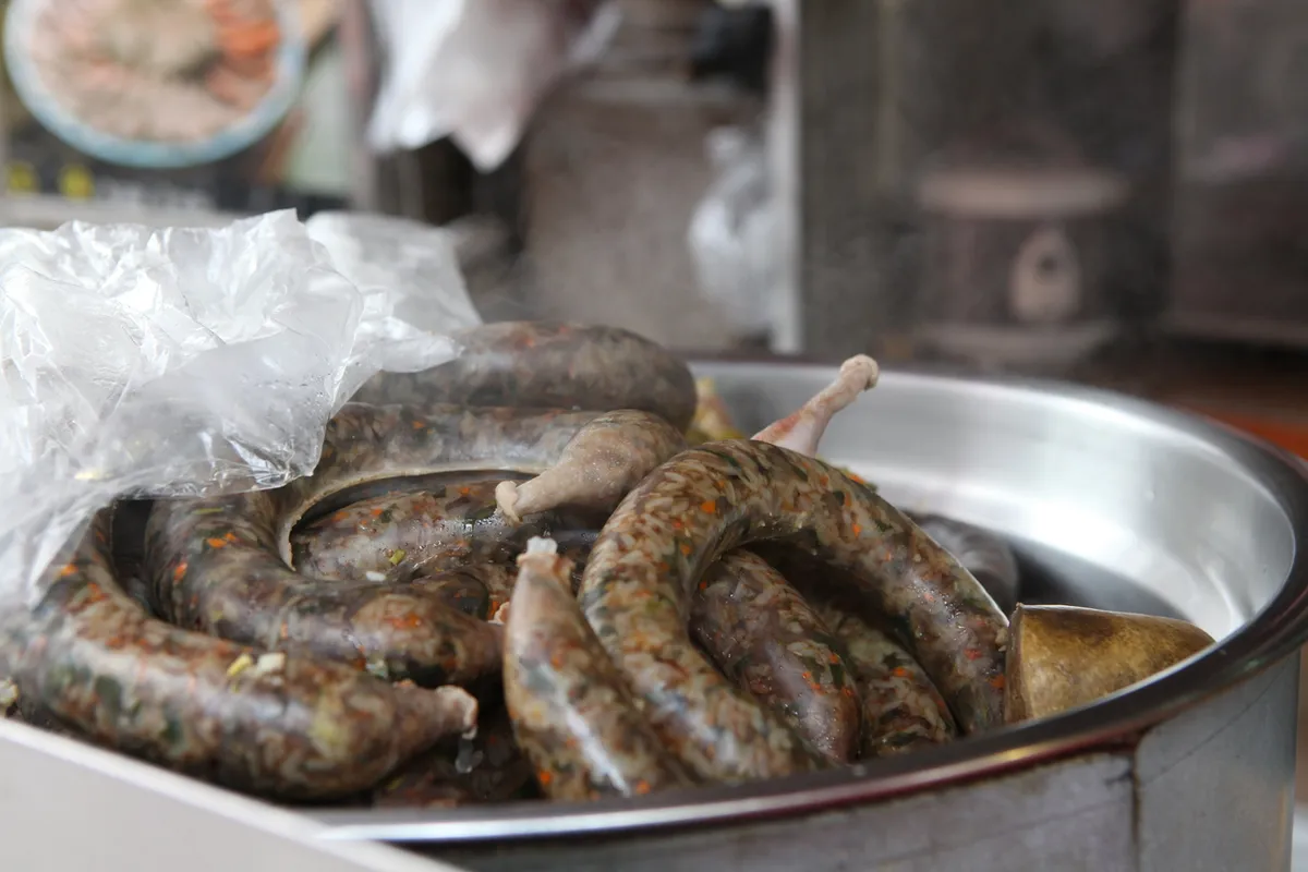 Sundae Korean blood sausage at a traditional market street food stall