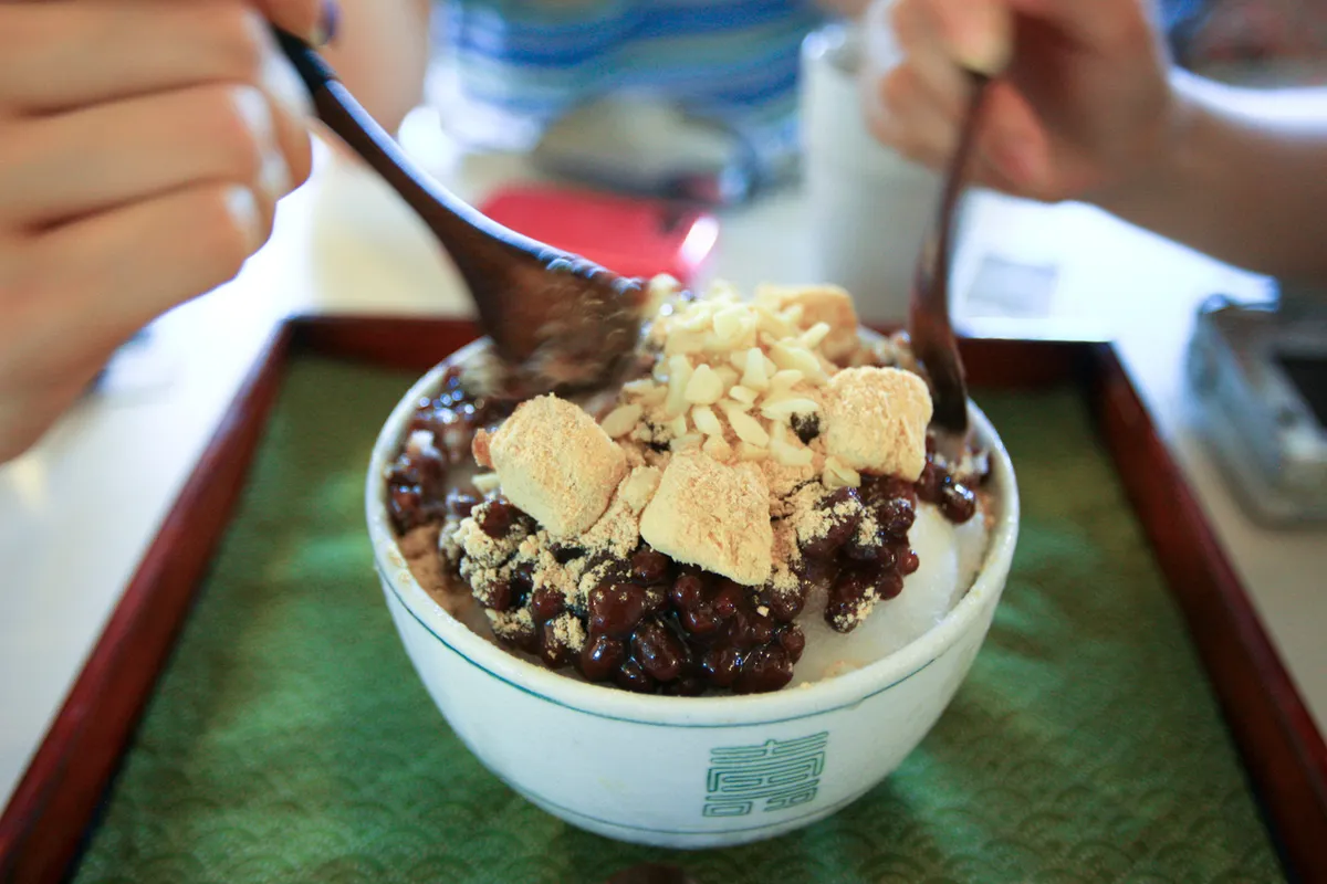 Patbingsu shaved ice served in a Korean cafe bowl