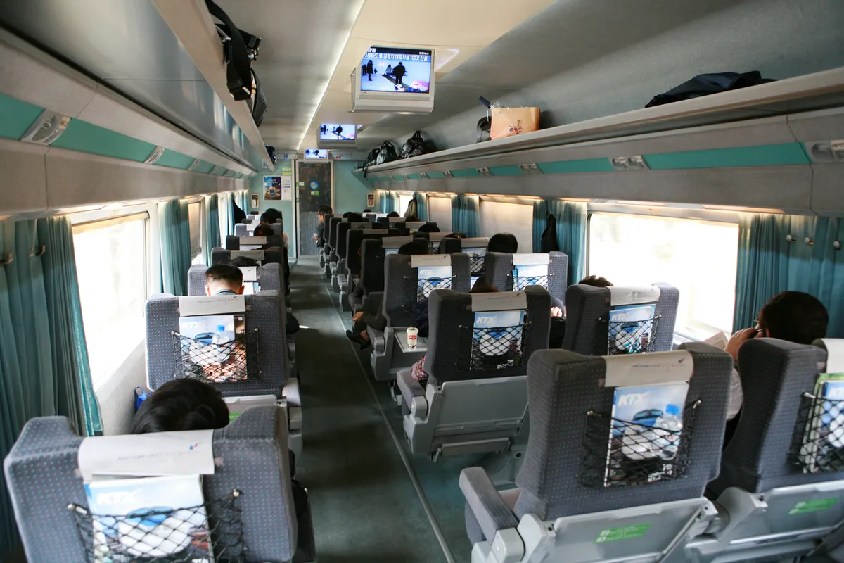 KTX train beside a platform for Korea high-speed rail travel