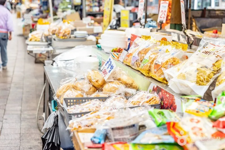 Packaged snacks and dried food products displayed at Sinpo International Market