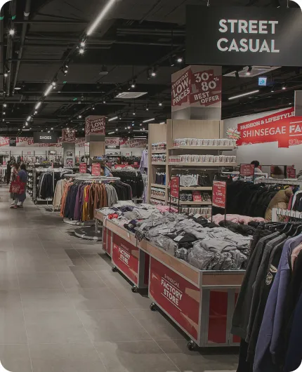 Clothing racks and sale tables at Shinsegae Factory Store in Starfield Suwon