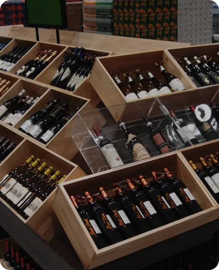 Bottles displayed in wooden bins at Traders Wholesale Club in Starfield Suwon