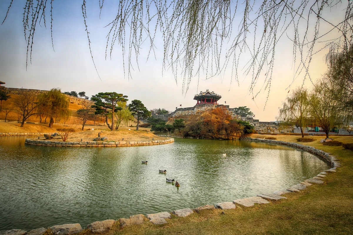 Banghwasuryujeong Pavilion and Yongyeon Pond beside Suwon Hwaseong fortress walls