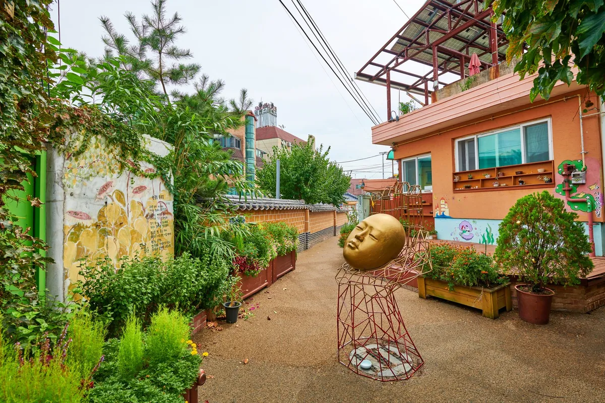 Wall murals in Jidong Mural Village near fortress walking route