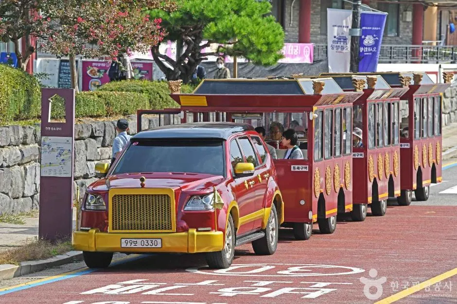 Hwaseong Fortress Tourist Trolley operating near fortress attractions