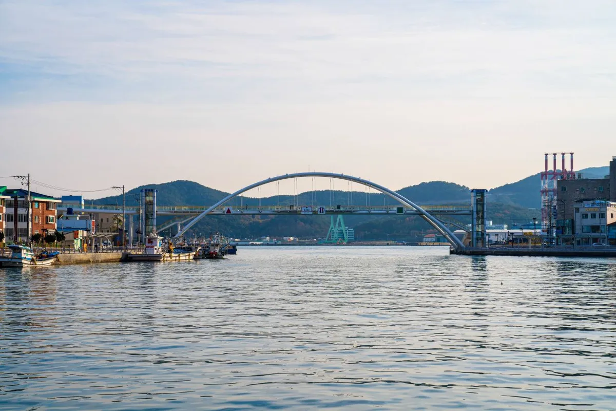 Bridge and waterfront buildings viewed across Gangguan Port in Tongyeong