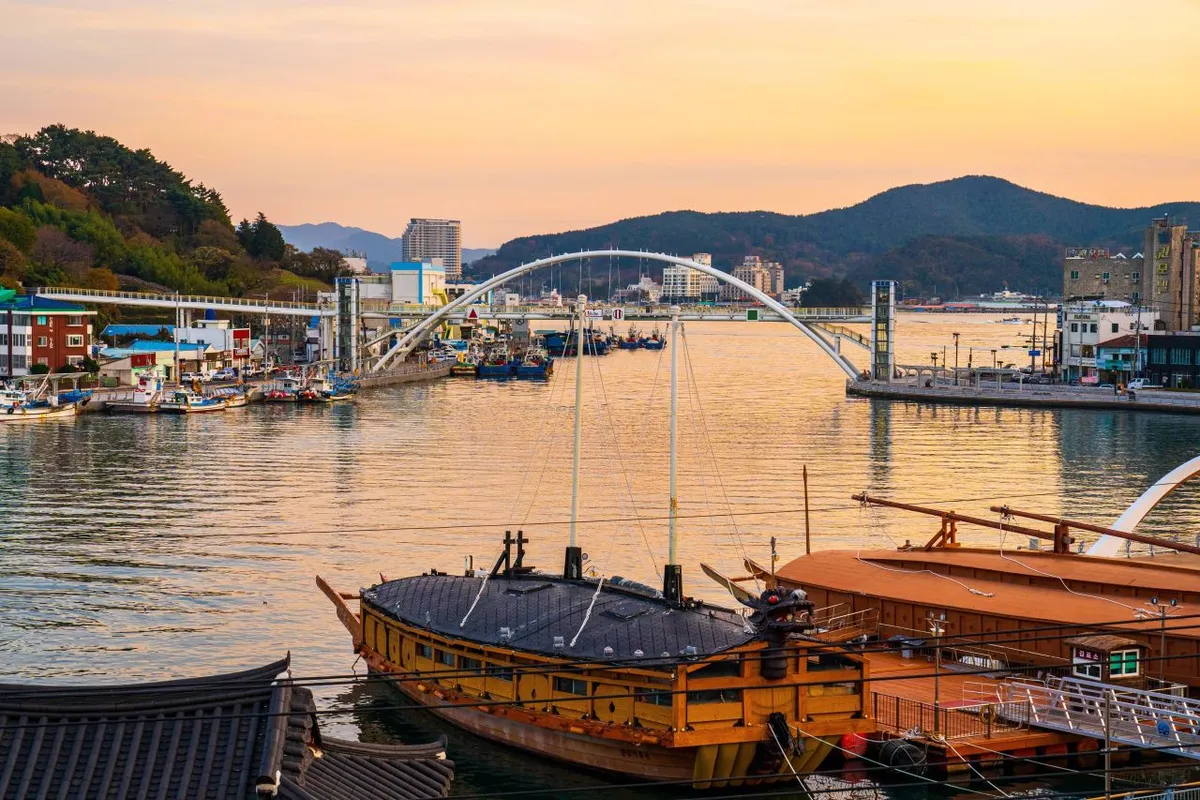 Turtle ship display and harbor water at Gangguan Port in Tongyeong
