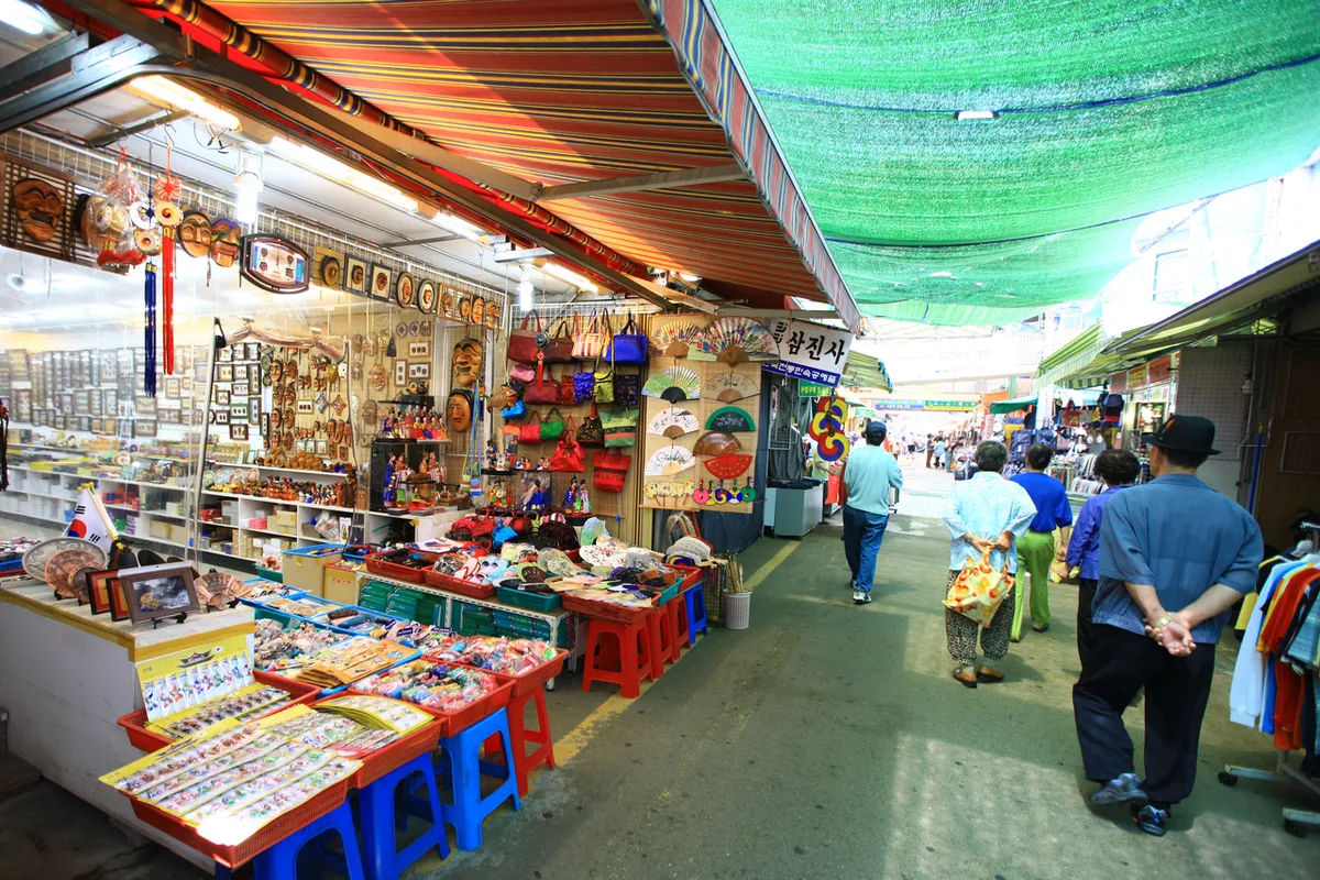 Shop-lined alley inside Gukje Market in Busan for Korean market shopping