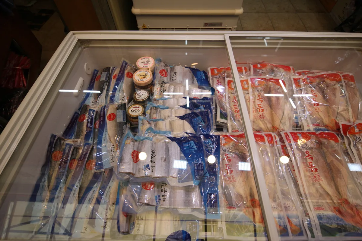 Seafood cases inside Dongmun Traditional Market in Jeju