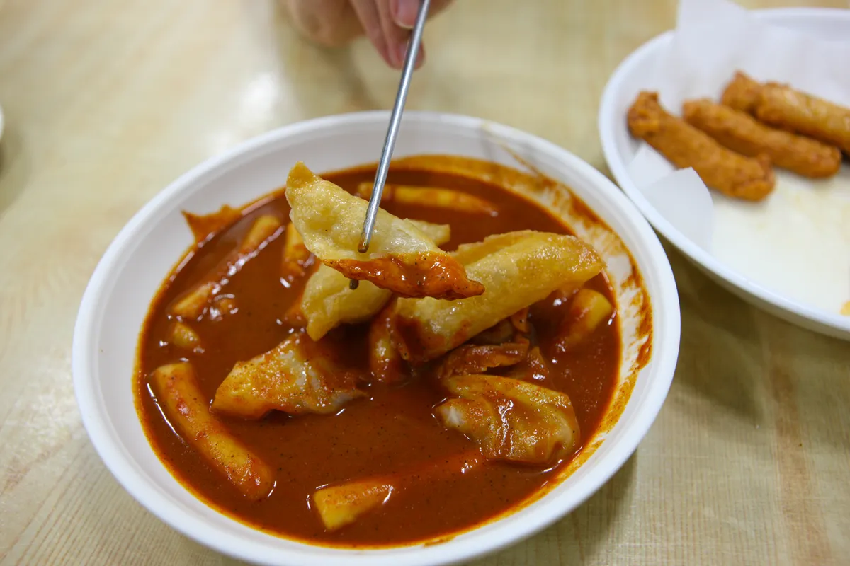 Bowl of Daegu-style red tteokbokki with fish cake in sauce