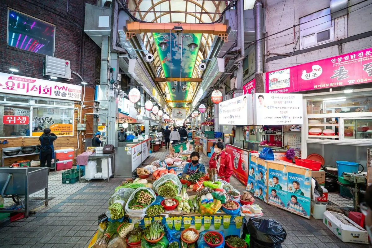 Produce stalls inside Andong Old Market in central Andong